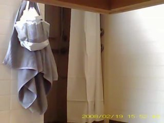 Spying tempting 19 year old Ms showering in dorm bathroom